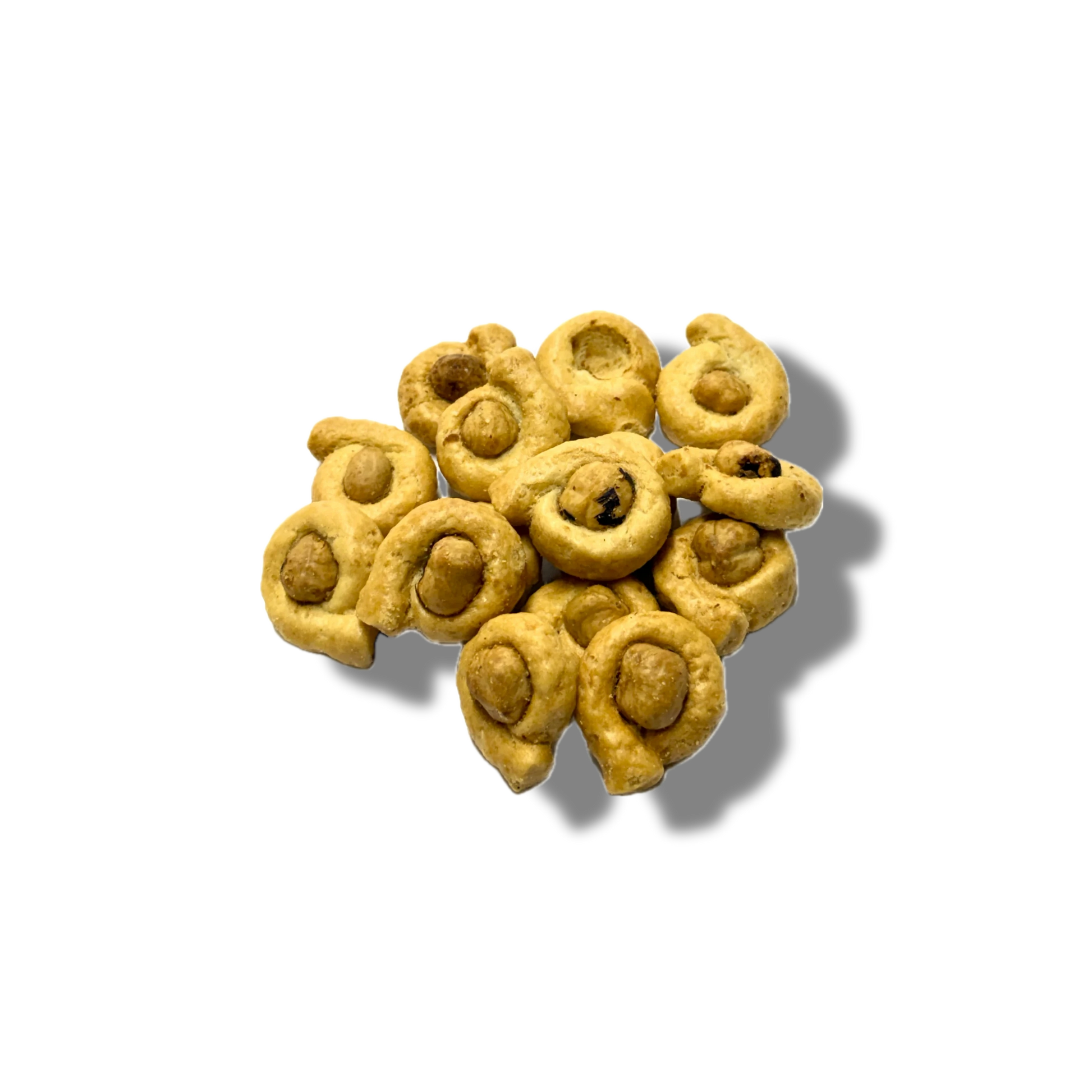Tarallini all'olio con una nocciola tostata giusto al centro, ottimi per aperitivi e come snack